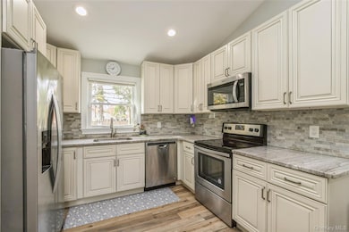 1692 Feureisen Ave, Bohemia, NY 11716 - photo 4