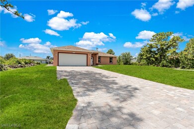 Single story home featuring an attached garage, a