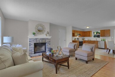 The fireplace makes a beautiful focal point in the