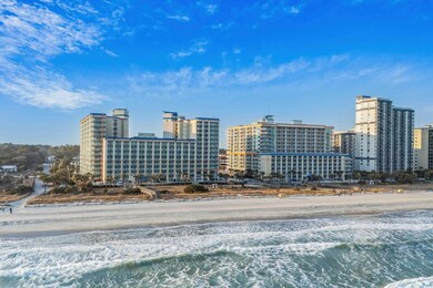 Property's view of city with a view of the beach a