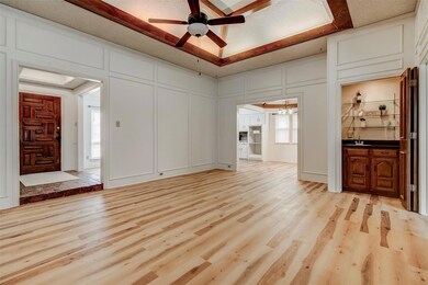front entry also leads to 1st large living room wi