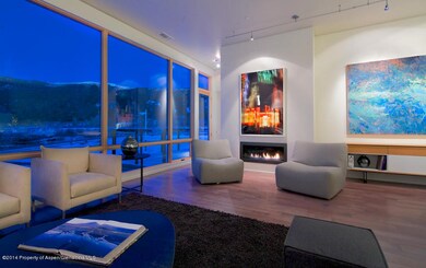 LIving Room with Fireplace and Windows