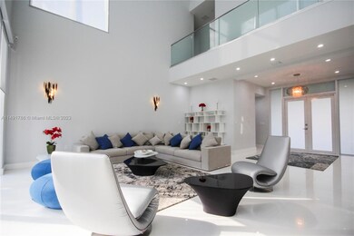 Spacious living room with 28' Ft high ceilings.