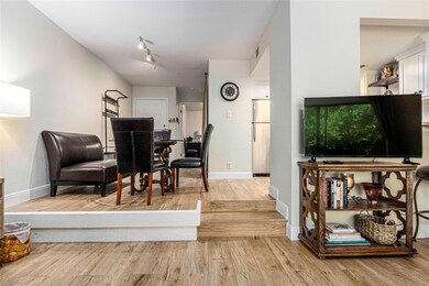 Living area featuring light wood finished floors 