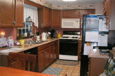 FULLY-EQUIPPED KITCHEN, CERAMIC TILE FLOORS...PLEN