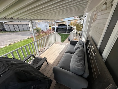 Porch featuring an outdoor living space