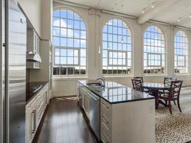 Kitchen features stainless appliances, multiple di