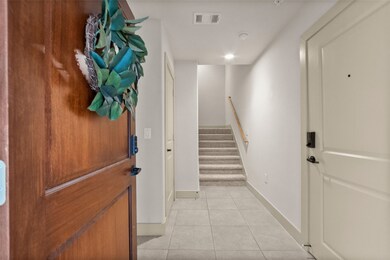 Spacious foyer as you step inside the townhome. En
