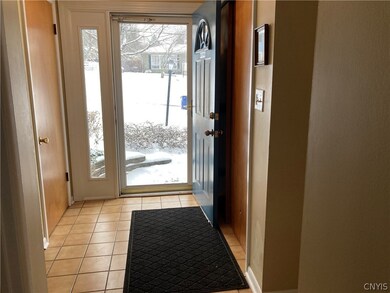 Spacious tiled entryway with TWO closets and easy