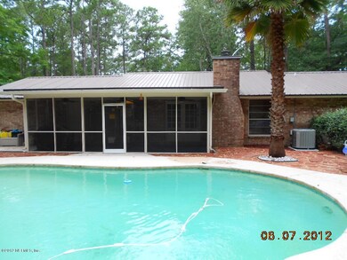 10911 Pine Estates Rd W, Jacksonville, FL 32218 - photo 2