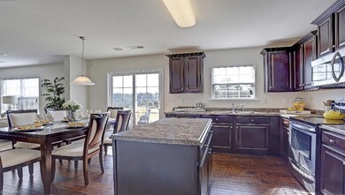 Similar home, same floor plan. Under construction. Options and colors may vary.Home decor, decorative paint and furnishings are not included. All pictures are of a decorated model and are only being used to demonstrate use of space with the plan and are not in actual home.