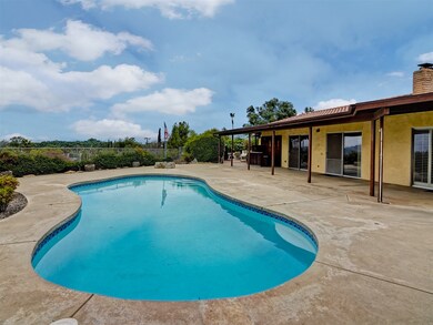Unobstructed view over pool looking East.