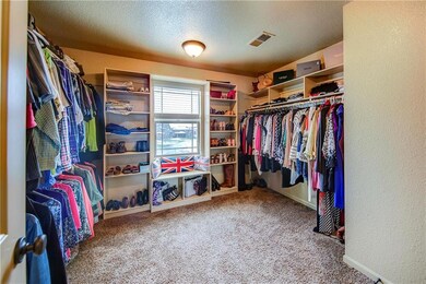 PLEANTY OF ROOM IN THIS EXPANDED MASTER CLOSET.