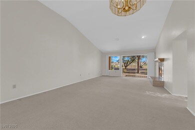 Unfurnished living room with baseboards, a notable