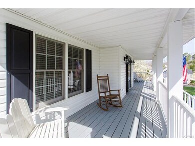 Ahhh! An inviting and spacious country front porch