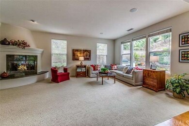 Sweeping Corner Fireplace and Spacious Family Room