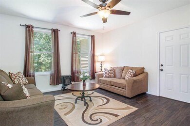 Open to Kitchen & Dining Room.