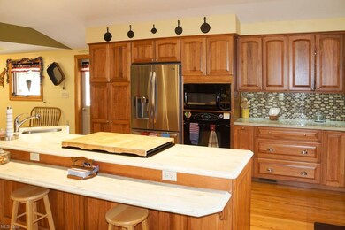 Kitchen pantry has pull out drawers.