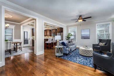 Gleaming hardwoods and amazing moldings!  No carpet on first level!