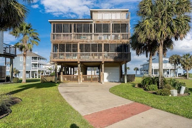 Enjoy two levels of screened-in porches at the fro