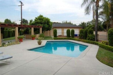 Huge backyard, swimming pool, built in cook area, 