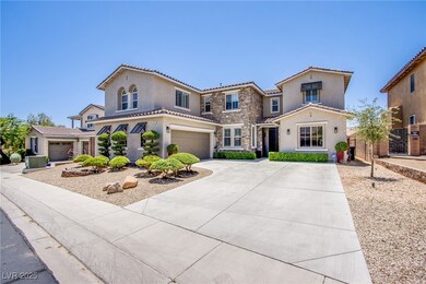 Mediterranean / spanish-style home featuring a gar