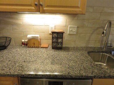 Granite countertops & tile backsplash