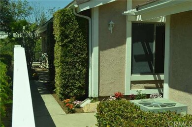 Attractive walk toward front door.
