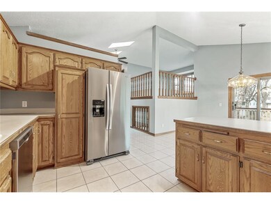 Kitchen looking up to family room
