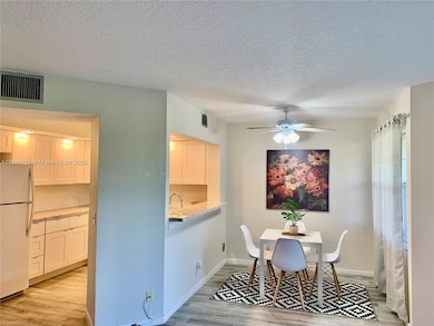701 SW 128th Ave unit 103F, Pembroke Pines, FL 33027 - photo 2