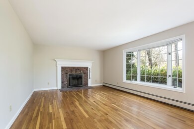 Living Room w/ Wood Burning Fireplace