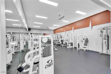Exercise room featuring ceiling fan