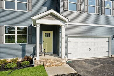 Property entrance with a garage