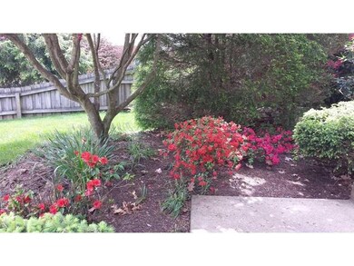 Exterior Front. Lush plantings greet you at the fr
