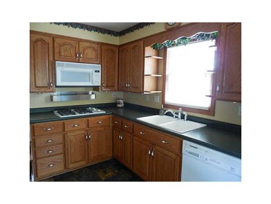 Kitchen. Updated kitchen has gas cook top and buil