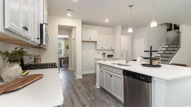 Kitchen featuring appliances with stainless steel 