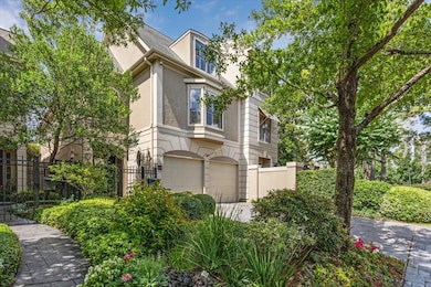 Property has a private driveway and great curb appeal with mature trees and landscaping.