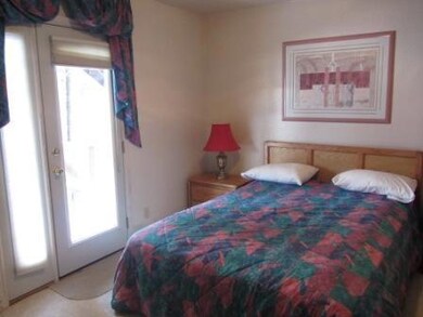 Bedroom with door to deck