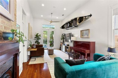 Living Room with French doors that open to the dec