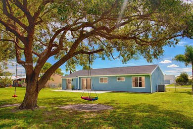 Huge fenced backyard with mature trees 