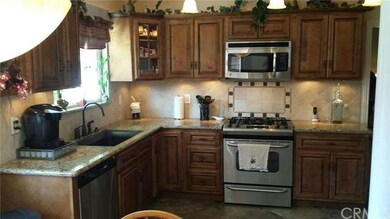 Upgraded gourmet kitchen with granite counter tops