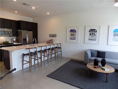 Kitchen with appliances with stainless steel fini