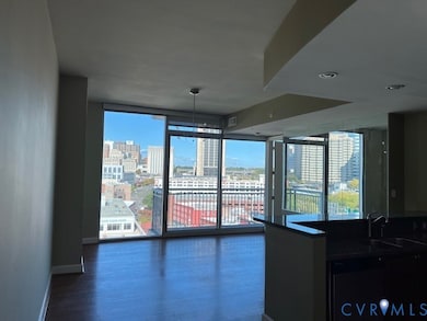 Open Concept Living Room/Kitchen. Pull down blinds