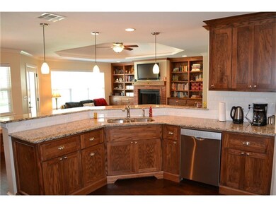 The open floor plan allows you to watch TV or the 