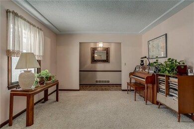 Living Room with View of Front Foyer