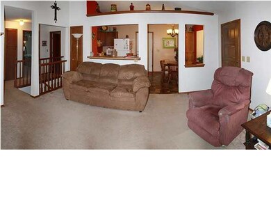 Spacious 15' x 16' living room features a cozy fir