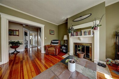 living room with hardwood floors and fireplace