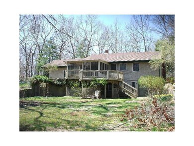 Exterior Back. Large, partially fenced  rear yard