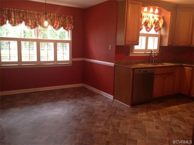 Bright, sunny eating area in kitchen.