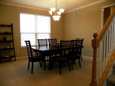 Dining Room. Big enough for any family gathering. Notice the stylish light fixture.